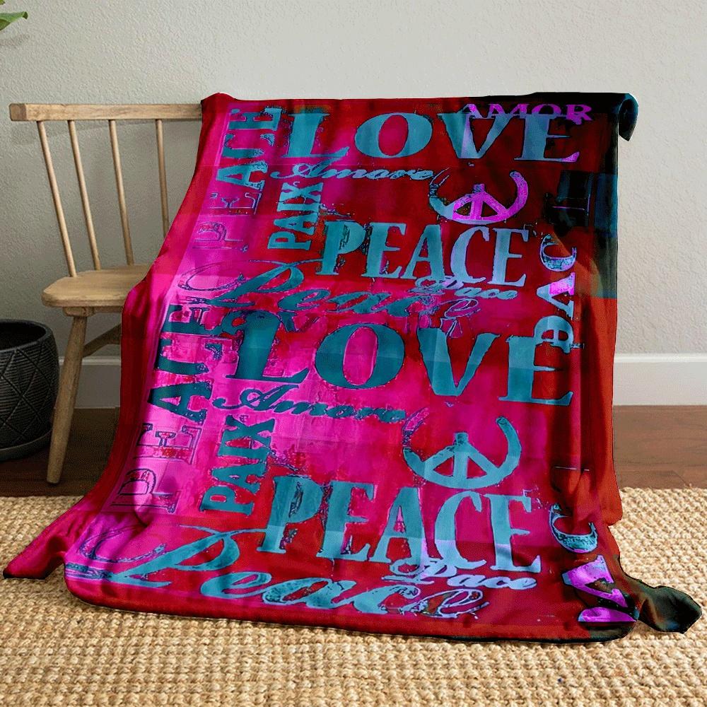 The pattern features colorful "LOVE" and "PEACE" text with peace symbols. for all seasons blanket lunch break throw gift