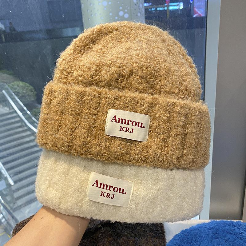 Winter warm plush wool hat women's new soft versatile ear protection hat couple shopping sticker really cold hat