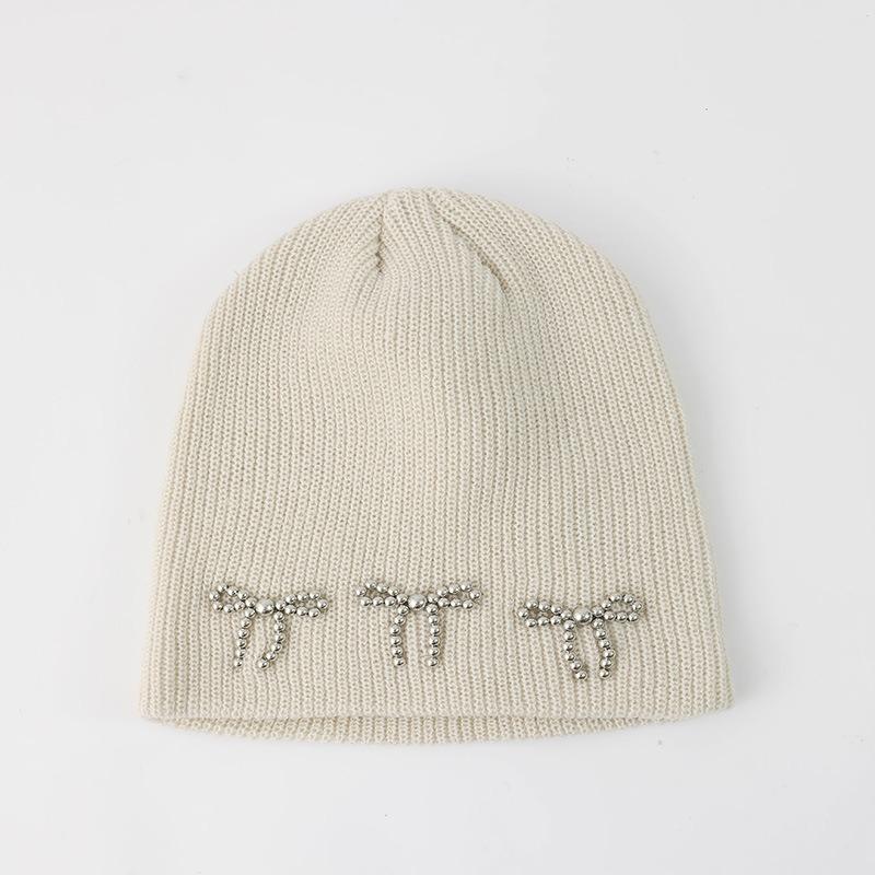Шапка вязаная с жемчужным бантом для блогеров, женская зимняя однотонная, ветрозащитная и теплая, двухслойная, с защитой ушей, шерстяная шапка