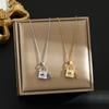 Light Luxury Titanium Steel Necklace for Women's Micro Set with Full Diamond Clover Lock Head Pendant  Necklace Chain