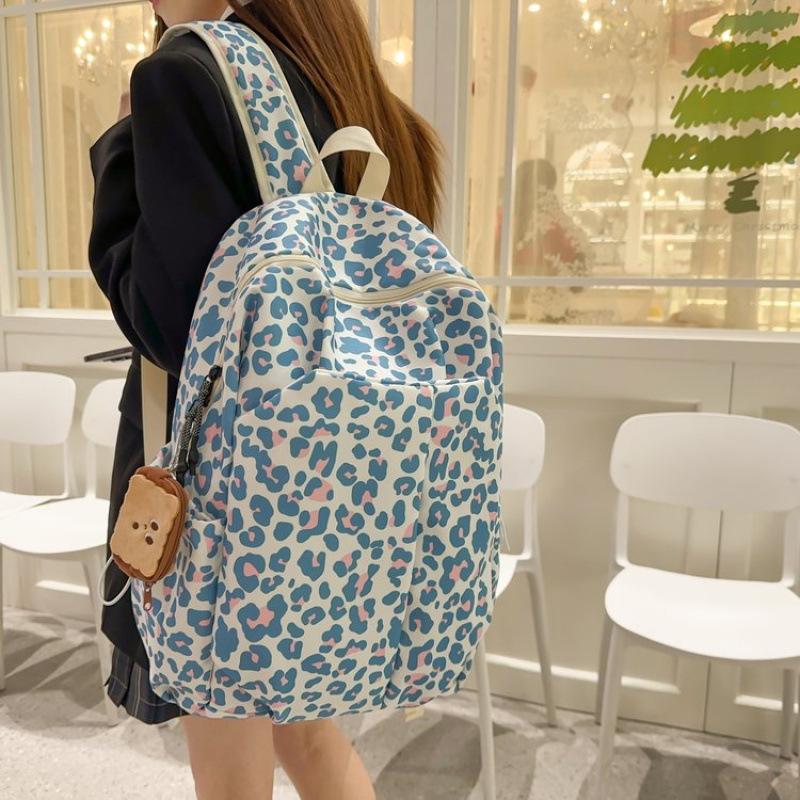 Schoolbag new junior high school girls large-capacity backpack pink leopard print high-value ins wind niche schoolbag casual backpack