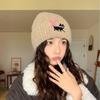 Warm waxy kitten bow versatile embroidered knitted wool hat showing face small cold hat autumn and winter new trend ear protector