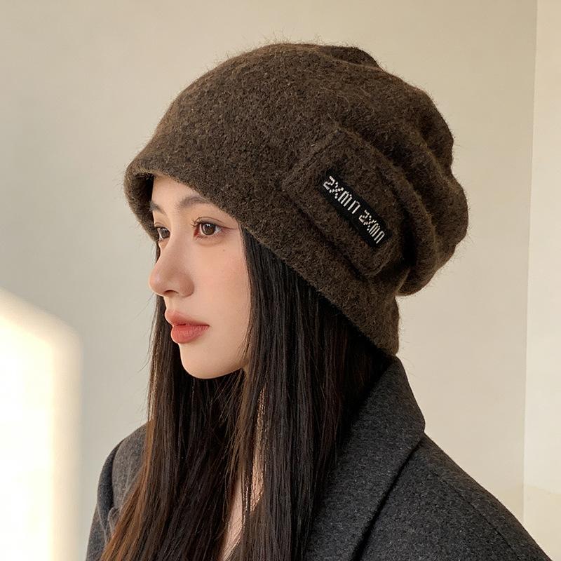 New autumn and winter hats, women's stacking hats, small face baotou hats, cold-proof and warm ear protectors, pullover hats, tide