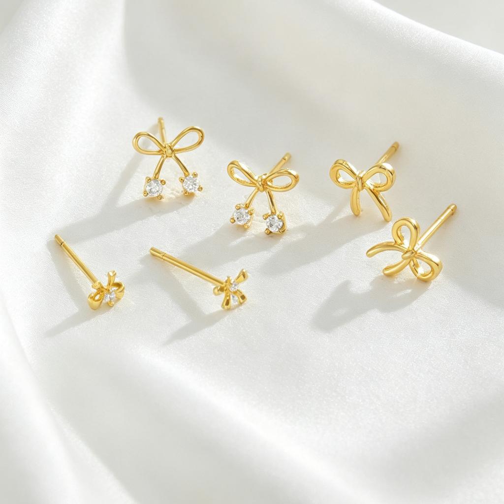 Hot-selling European and American diamond-encrusted bow stud earrings simple and sweet copper-encrusted zircon earrings women's stud earrings set
