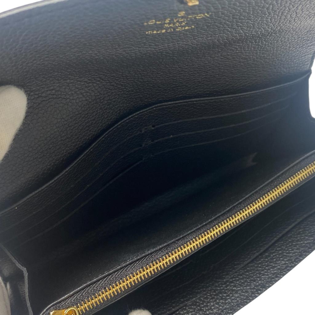 Подержанный кошелек LOUIS VUITTON Серия Black/Кремовый тип кожа Женский