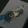 Элегантная брошь в виде павлиньего пера для женщин
