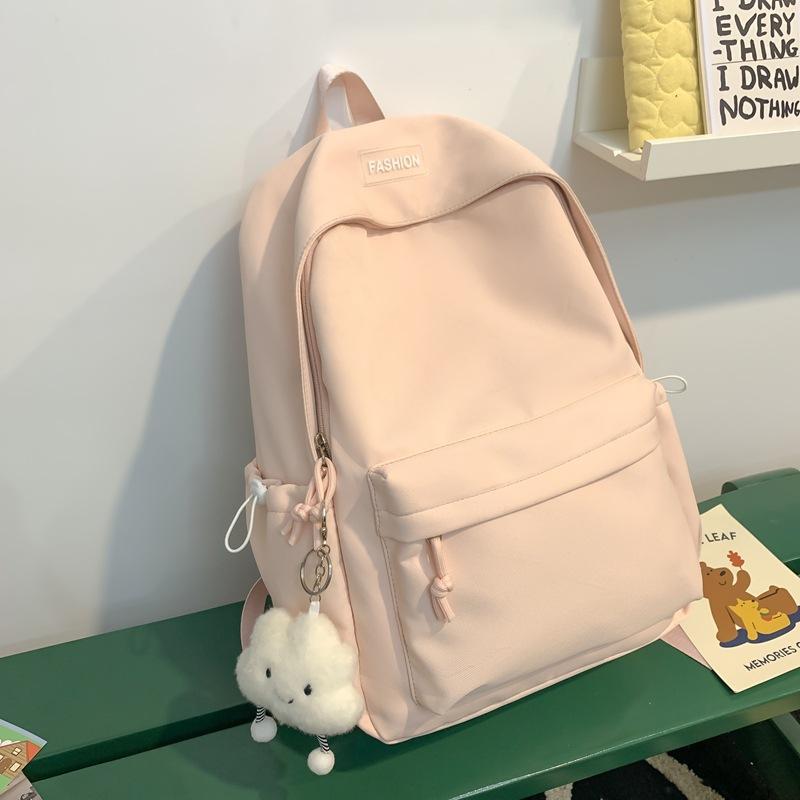 The Schoolbag Is Fresh and Sweet, and the Solid Color Is Versatile and Simple. The Schoolbag for Junior High School Students Is Light