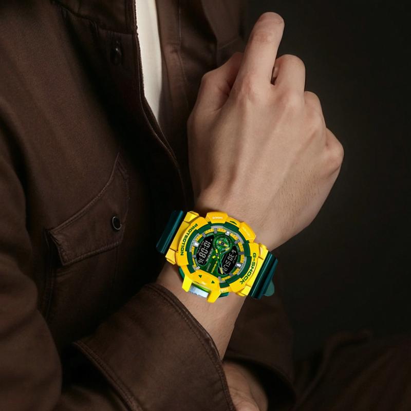 Casio Серия с двойным дисплеем LCD/Стрелки Яркие контрастные цвета Спортивные водонепроницаемые Бразильские цвета Интуитивное управление Вращающаяся заводная головка Большие GA-400CS-9APR