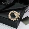 Korean Trendy Rhinestone Pearl Bow Brooch – Versatile Fashion Corsage Pin