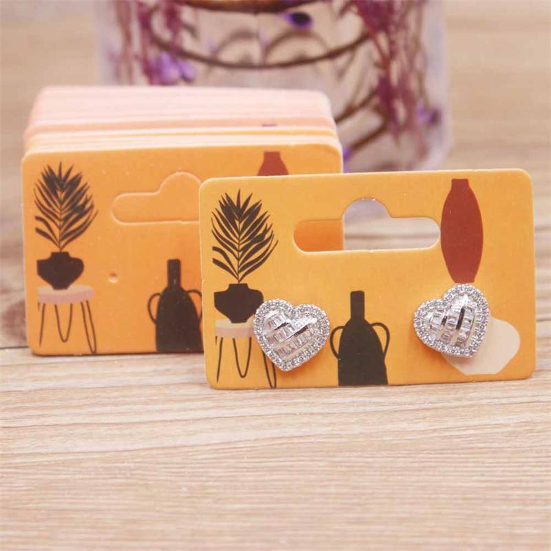 50 шт./лот 5,5x3,5 см горячая распродажа новый комикс стиль красивая подмигивающая девушка / сделать фото девушка серия гвоздики серьги-подвески упаковка шаблон карты