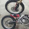 Комплект передних и задних тормозов для мотоцикла NISSIN HONDA CR125R CR250R CRF250X CRF450X Винт суппорта Пружина Тормозные колодки Ремонт тормозного цилиндра