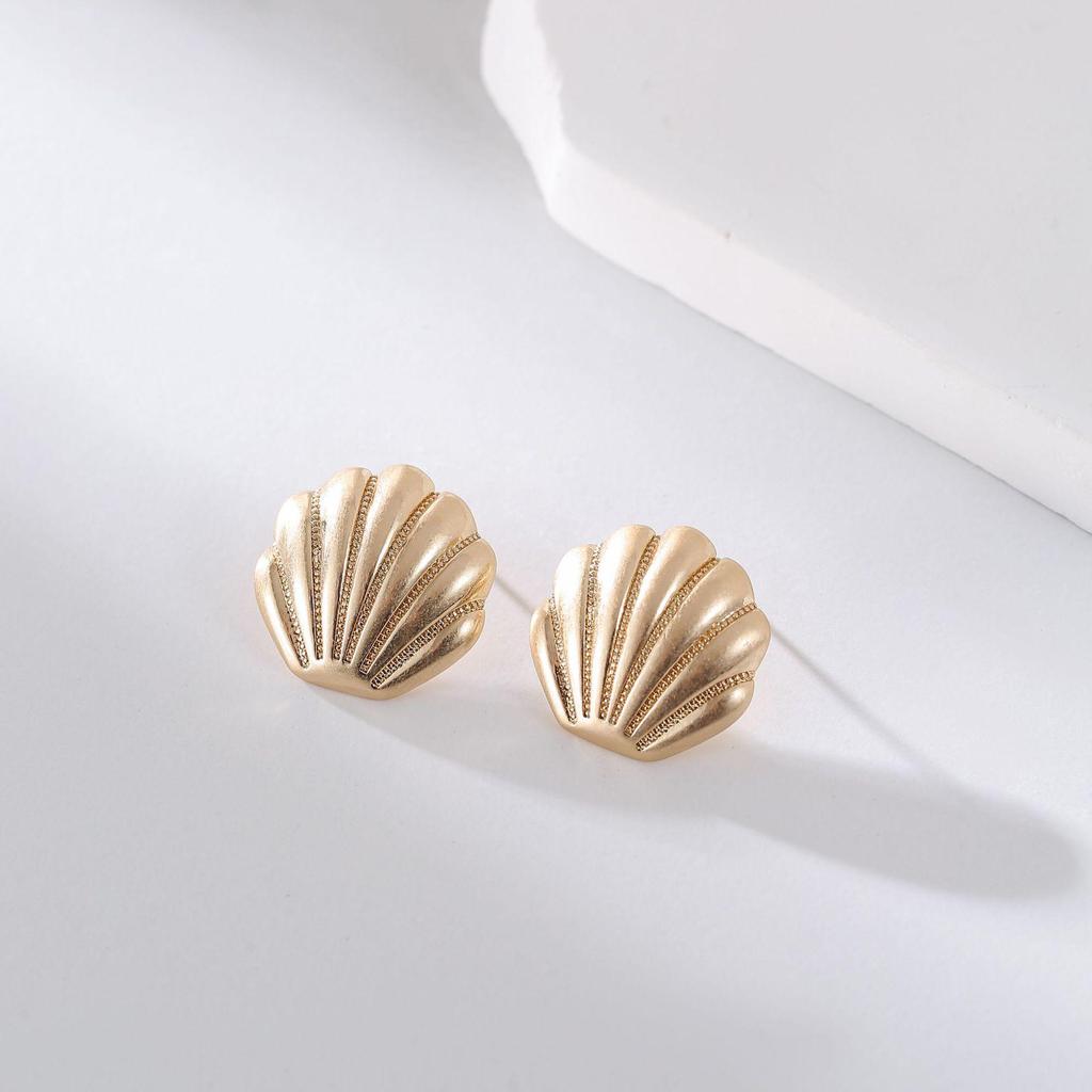 Минималистичные металлические серьги-кольца: Уникальный, смелый и стильный дизайн, который подчеркнет вашу модную ауру.