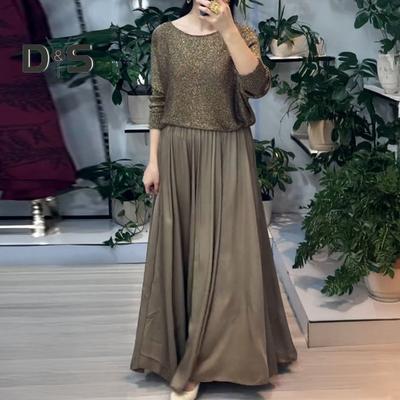 Женский комплект из двух частей: юбка, блестящий топ с круглым вырезом и длинными рукавами, а также юбка-макси А-силуэта с высокой талией, повседневный блестящий наряд