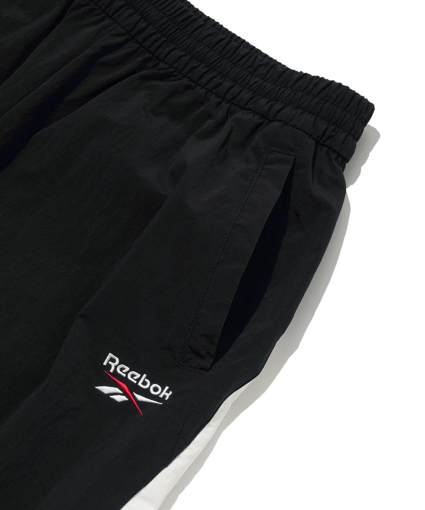 Reebok Теплые тренировочные брюки Heritage 2-Way - Черный