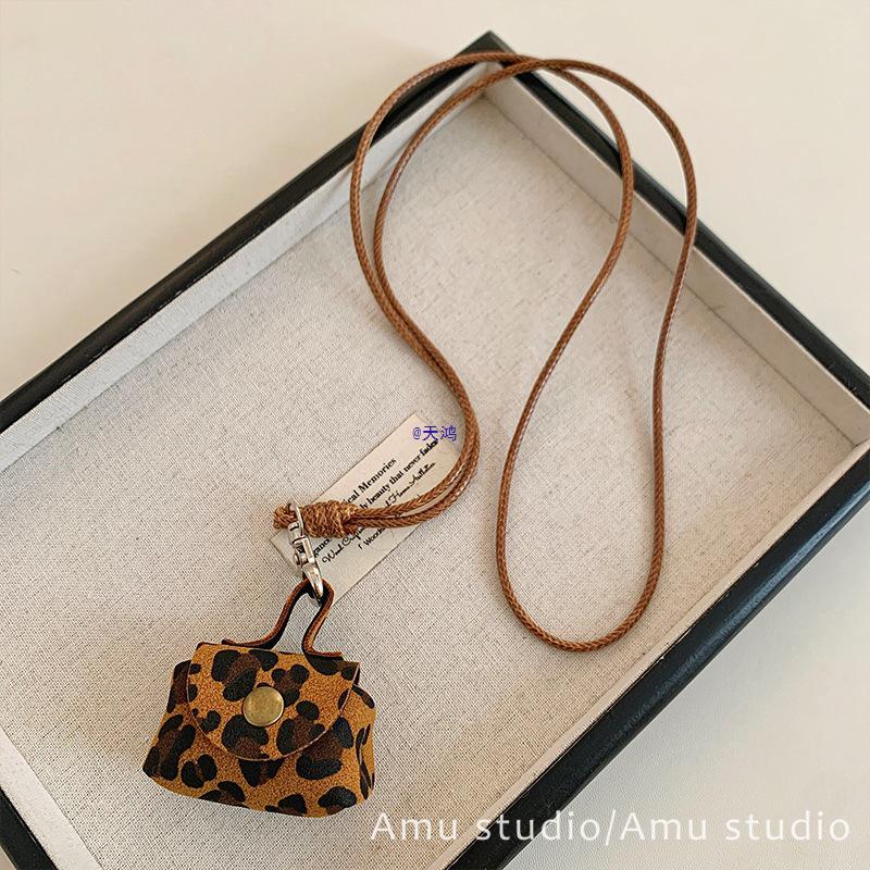 Ожерелье-кошелек для монет с леопардовым принтом: Женский кулон-чехол для наушников с кожаной цепочкой