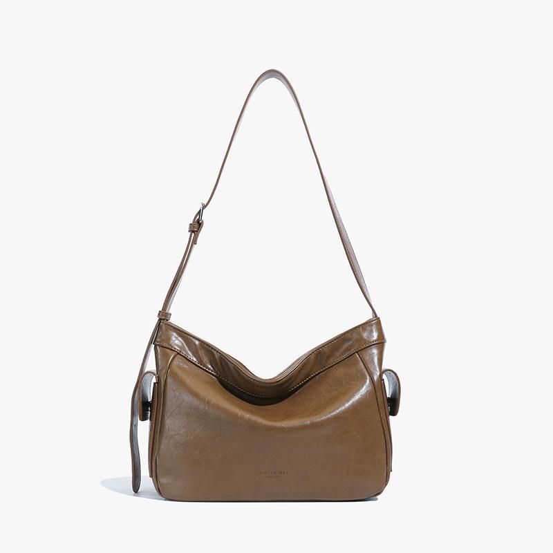 Корейская версия нишевый дизайн большая вместимость простая сумка-ведро женская 2025 осень и зима новая модная универсальная маленькая сумка-тоут