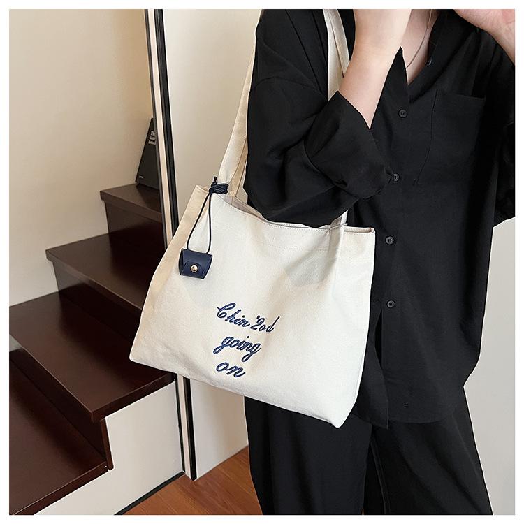 Simple Large-capacity Letter Canvas Bag Women's Summer New Commuter Shoulder Daily Travel School Bag
