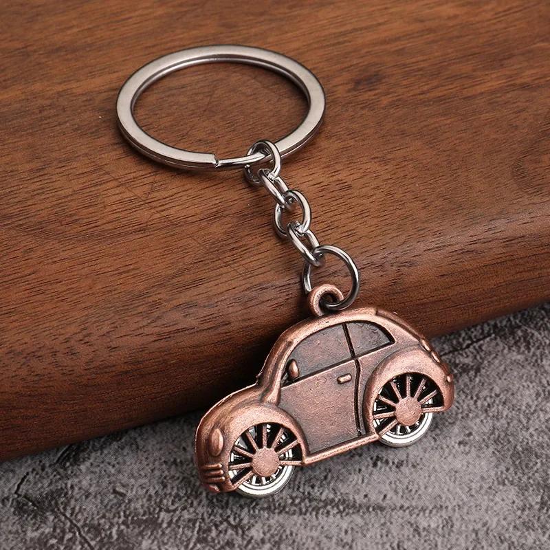 Разноцветный креативный автомобильный брелок Металлический брелок Мультяшный автомобильный кулон Маленький подарок
