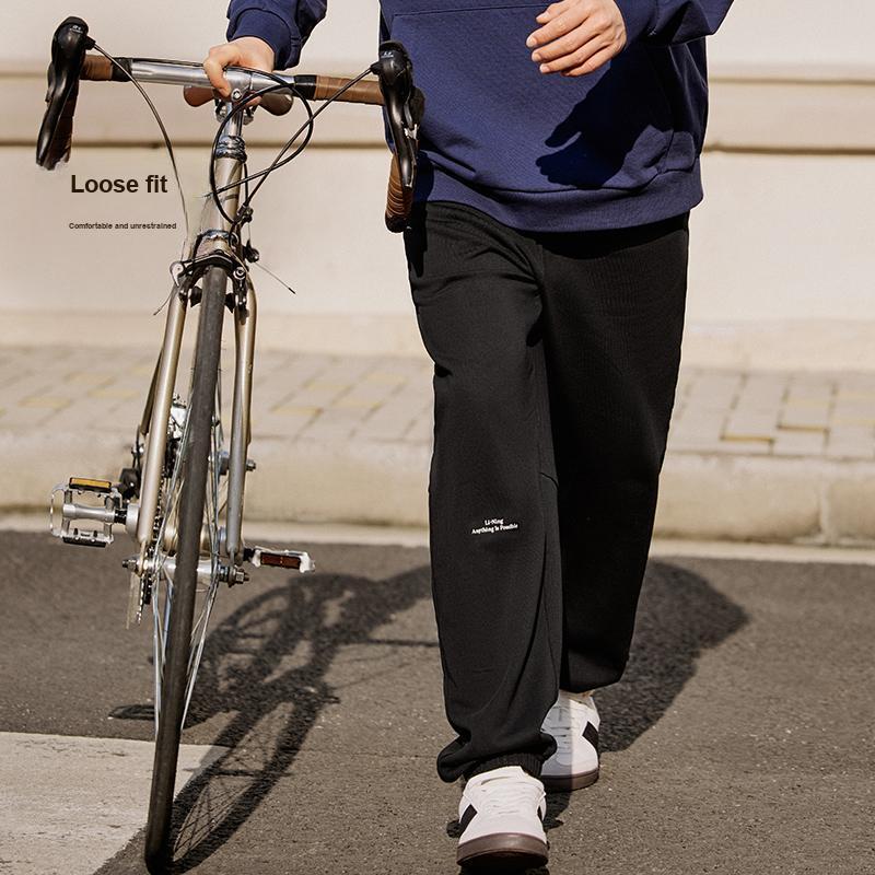 Li-Ning Выходные молодежные однотонные повседневные зауженные трикотажные спортивные брюки унисекс черные AKLU711-6