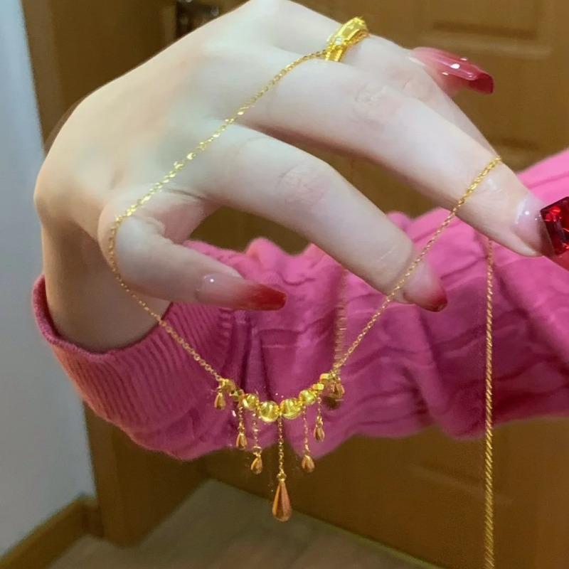 Ожерелье-капля воды с кисточками в стиле «кошачий глаз» для женщин, легкая роскошь, динамичное ожерелье с лазерными бусинами, изысканная и высококлассная цепочка для ключицы