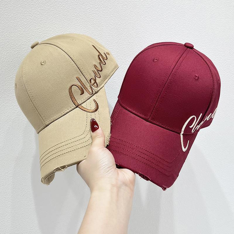 The new fashionable baseball cap is a versatile accessory for women in spring and summer. It features a large brim, which not only provides sun