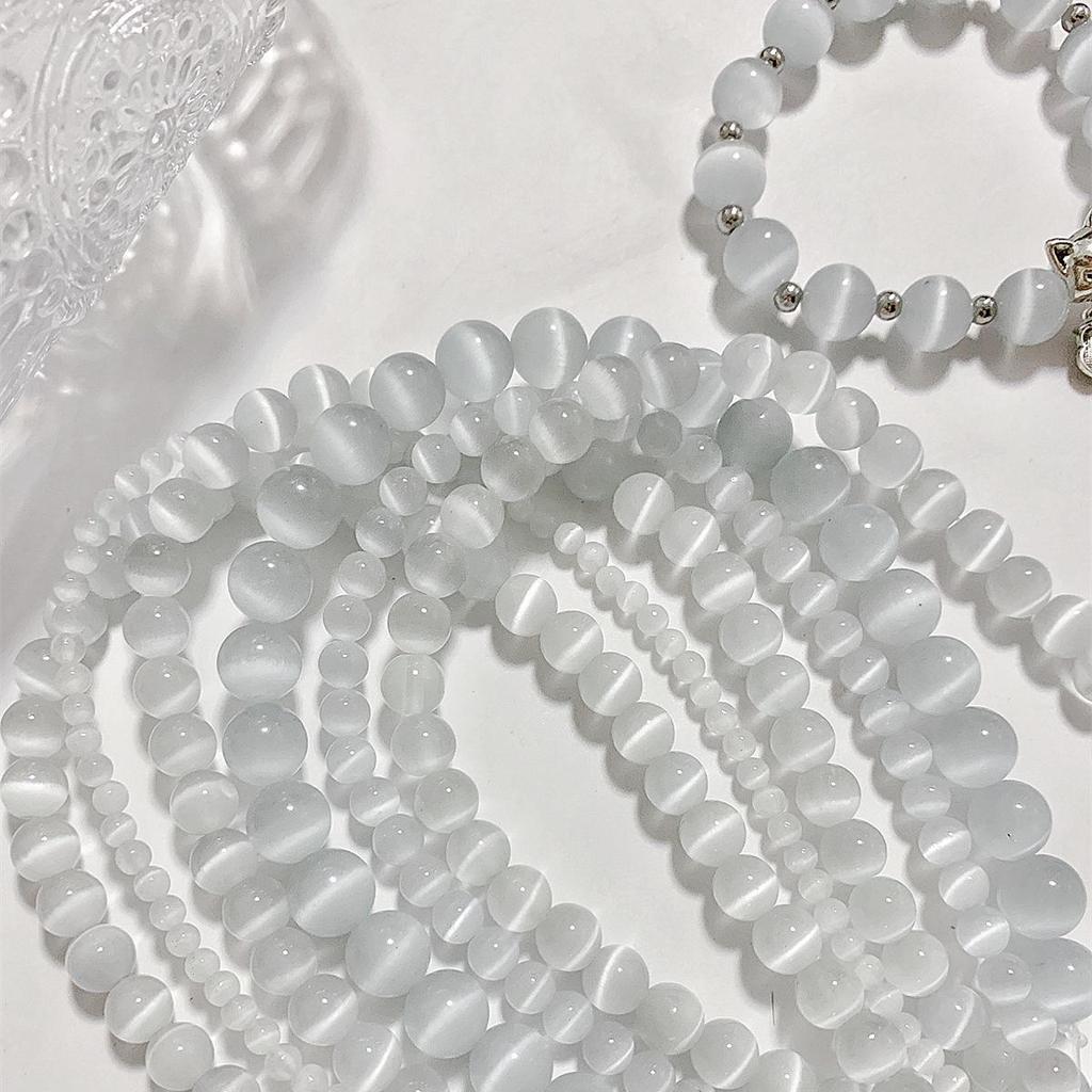 Бусины из лунного камня с эффектом кошачьего глаза холодных тонов 6-10 мм для изготовления украшений своими руками