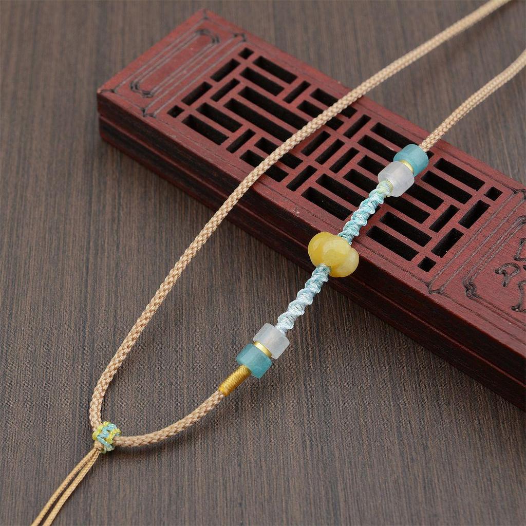 Плетеное макраме ожерелье с кристаллом авантюрина и подвеской из тыквенного нефрита