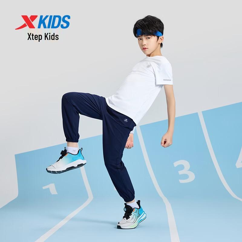 XTEP Youth Ice-Feel Quick-Dry Hexagonal Print Long Pants