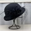 Internet celebrity sweet mesh camellia flower bucket hat female Hepburn style elegant top hat wool basin hat temperament shows small face