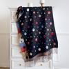 Women's vintage floral jacquard scarf—a large, faux-cashmere wrap featuring contrasting-color tassels, suitable for layering.