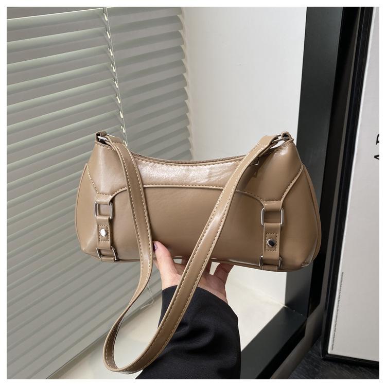 Однотонная простая сумка-багет женская 2025 новая модная нишевая дизайнерская сумка на плечо универсальная повседневная сумка подмышку