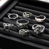 European and American-style fashion jewelry, suitable for work, with a light luxury aesthetic: butterfly chain, black resin ring, unique design,