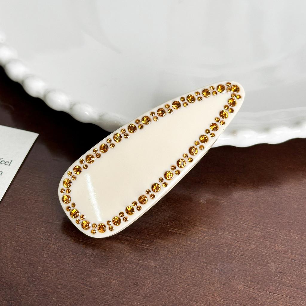 Элегантная весенняя заколка со стразами для шикарной прически в универсальных цветах и дизайнах