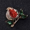 Женская брошь с кристаллами "гранат"