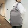 Повседневный пригородный рюкзак: Стильный однотонный дизайн, нейлон большой вместимости, регулируемые ремни и застежка-молния для ежедневного использования.