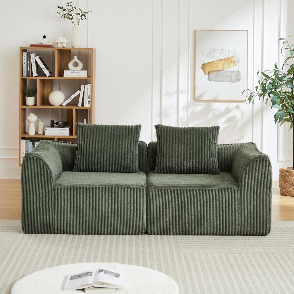 Minimalist Corduroy Sofa with Curved Lines and a Gently Sloping Backrest, Complete with Two Cushions.