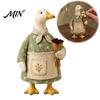 Garden Goose Figurine Rustic Figurine, Resin Statue with Apron Holding Flowers, Pastoral Style Decorations Cute Animal Ornament for Indoor Tabletop