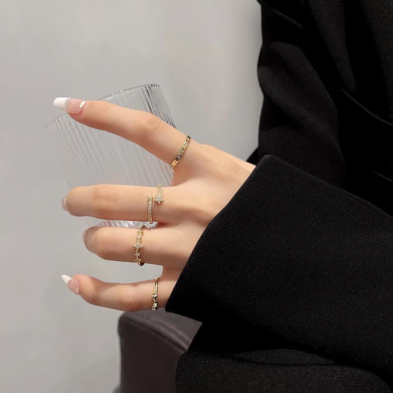 Xiaohongshu Blogger's Trendy Four-Piece Ring Set: Elegant, Simple Index Finger Designs Inspired by Internet Celebrities.