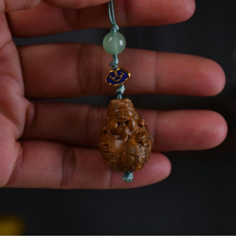 Twelve Zodiac Animal Charms Green Sandalwood Set: Rat, Ox, Tiger, Rabbit, Dragon, Snake, Horse, Sheep, Monkey, Rooster, Dog, Pig.