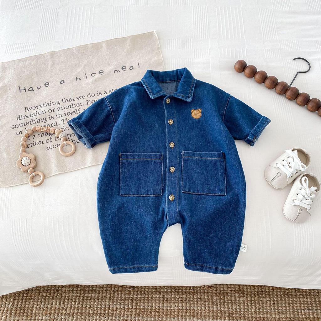 Baby Romper: Soft Denim, Turn-Down Collar, Snap Closure, Stylish Jumpsuit for 0-2 Years, Perfect for Spring & Autumn.