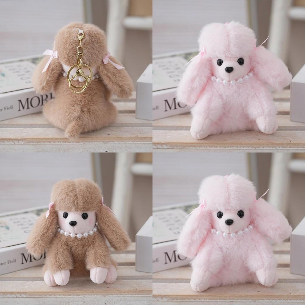 Милая плюшевая кукла-пудель в сидячем положении с пушистым бархатным мехом — идеальный подарок.