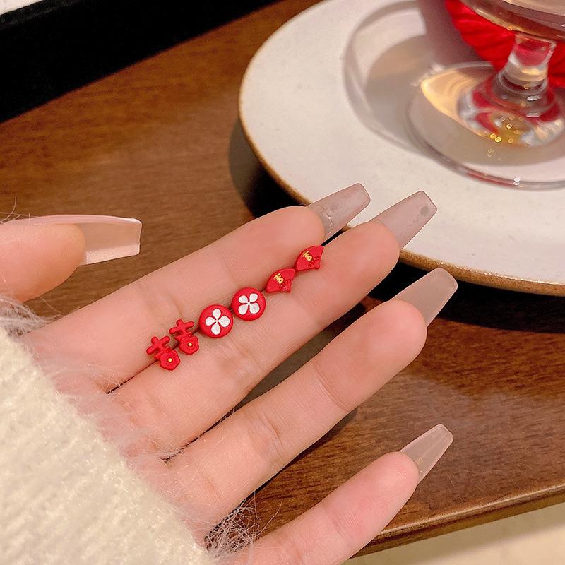 Red festive six-piece set, auspicious flower stud earrings, women's design sense, simple niche temperament earrings, new ear jewelry