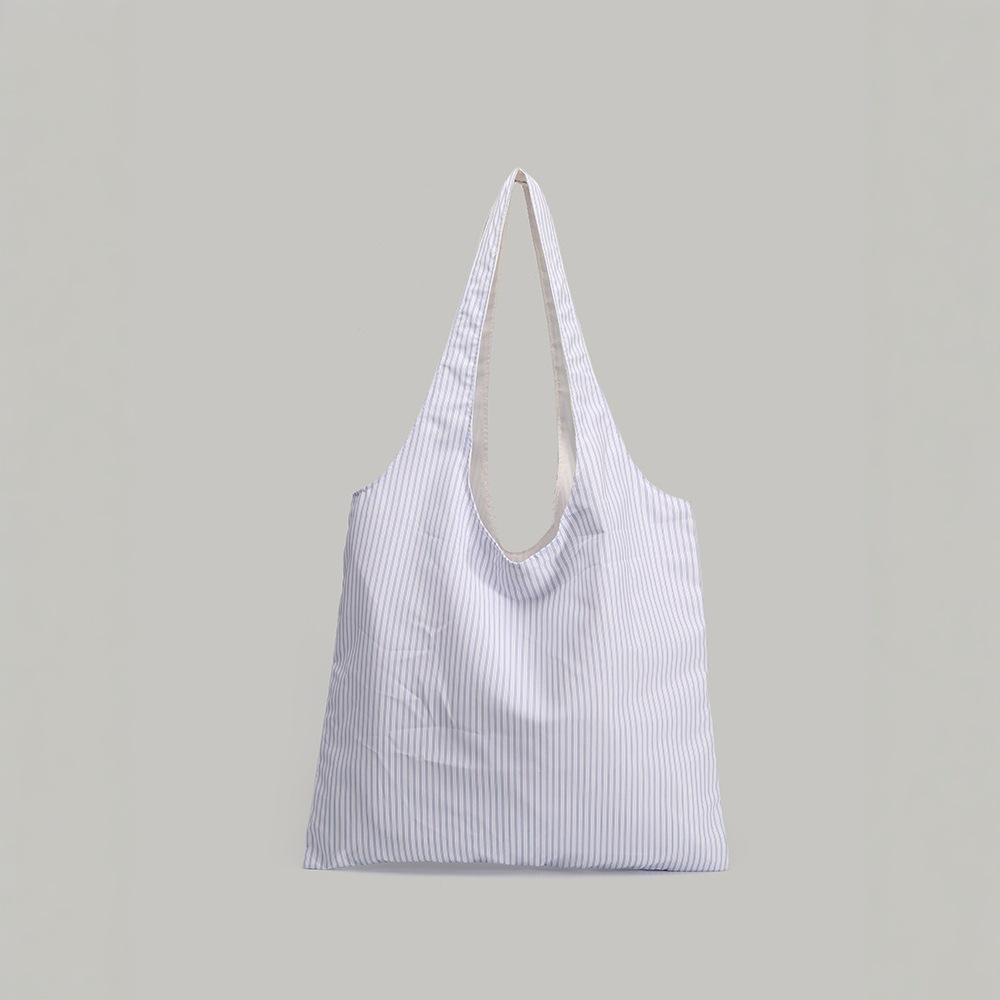 Niche Design Commuter Shoulder Bag 2025 New Korean Style Striped Large Capacity Letter Print Simple Versatile Fabric Bag