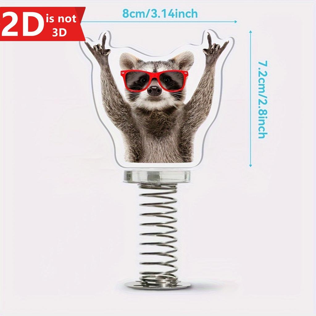 Cute 2D Swinging Raccoon, a Spring-driven Decoration for Desktops and Car Interiors.
