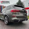 Комплект диффузора из углеродного волокна для BMW X5 G05: Передняя и задняя части с центральным крылом, верхним крылом, спойлером и задним крылом.
