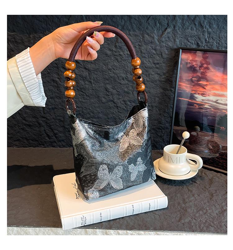 Осень 2025 Вышитая женская сумка-тоут под мышкой: Универсальный повседневный стиль ведра на плечо