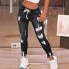 Stretchy Ripped Skinny Jeans for Women - 2024 Fashion with Drawstring Waist and Casual Wash.