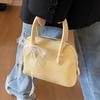 This year's new Korean version of niche high-end texture simple style portable shell bag casual versatile commuter messenger women's bag
