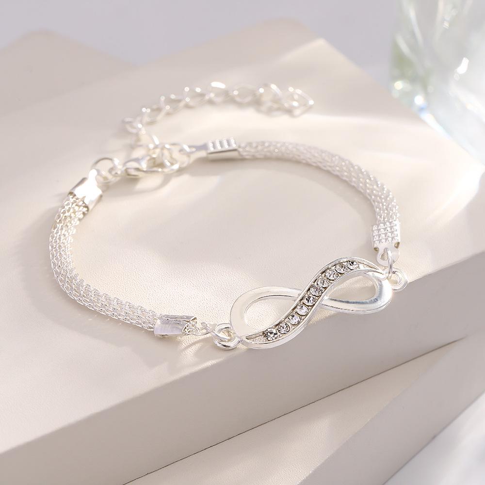 Infinity Symbol Women's Alloy Bracelet with Diamond Design