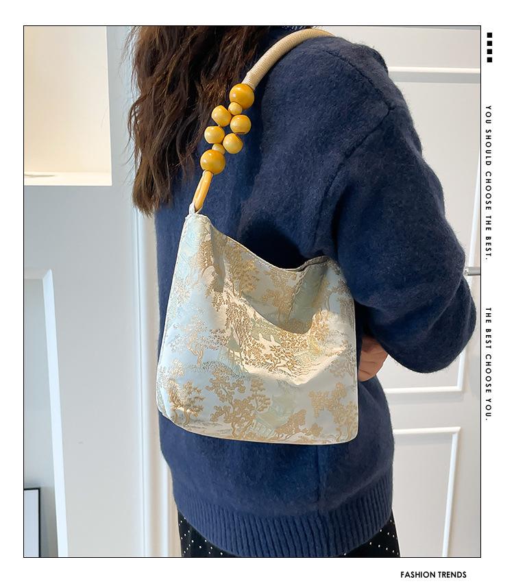 Осень 2025 Вышитая женская сумка-тоут под мышкой: Универсальный повседневный стиль ведра на плечо